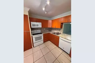1501 NE 191st St #C107, Miami, FL 33179 - Photo 7