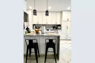 3450 Blue Lake Dr #107, Pompano Beach, FL 33064 - Photo 1