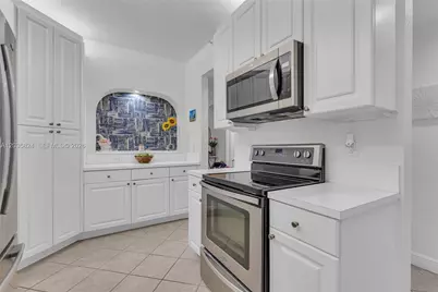 10710 NW 66th St #104, Doral, FL 33178 - Photo 25