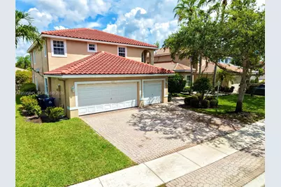 11927 NW 47th St, Coral Springs, FL 33076 - Photo 1