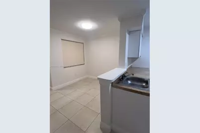 2880 N Oakland Forest Dr #107, Oakland Park, FL 33309 - Photo 5