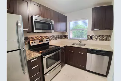 9460 Sunrise Lakes Blvd #309, Sunrise, FL 33322 - Photo 3