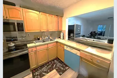 6070 W 18th Ave #209, Hialeah, FL 33012 - Photo 3