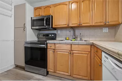6070 W 18th Ave #209, Hialeah, FL 33012 - Photo 7