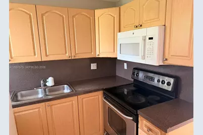 591 NW 65th St #104, Miami, FL 33150 - Photo 1
