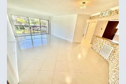 8955 Wiles Rd #208, Coral Springs, FL 33067 - Photo 3