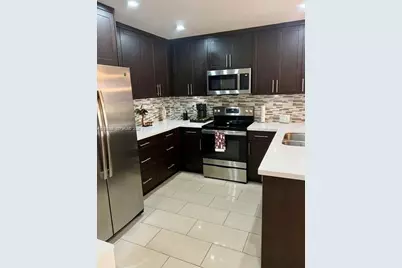 1701 NE 115th St #1A, Miami, FL 33181 - Photo 7