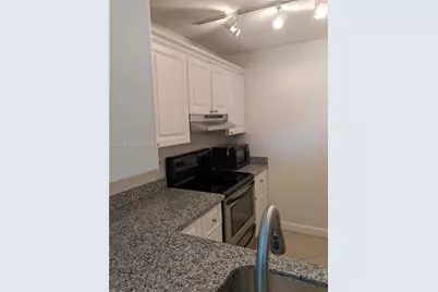 711 N Pine Island Rd #314, Plantation, FL 33324 - Photo 5