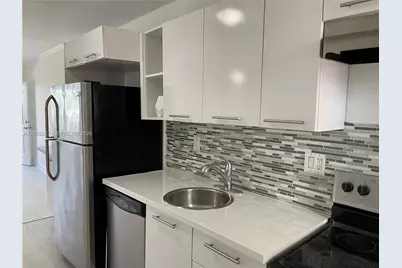 1450 NE 170th St #305, North Miami Beach, FL 33162 - Photo 21