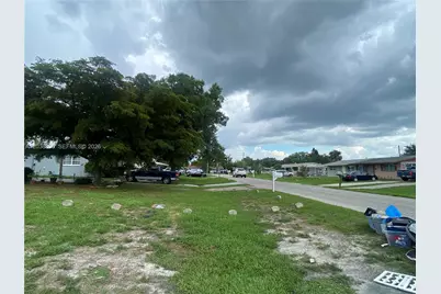 1111 N Vineyard St, Lehigh Acres, FL 33936 - Photo 3