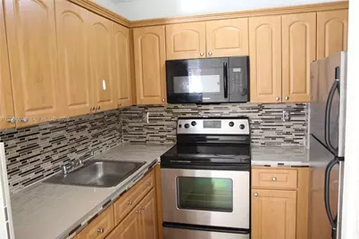 8075 NW 7th St #115, Miami, FL 33126 - Photo 15