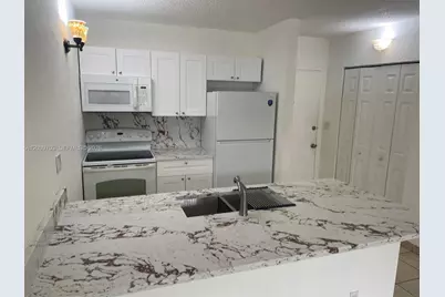 2401 Riverside Dr #203-B, Coral Springs, FL 33065 - Photo 1