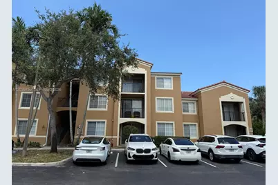8050 N Nob Hill Rd #105, Tamarac, FL 33321 - Photo 1