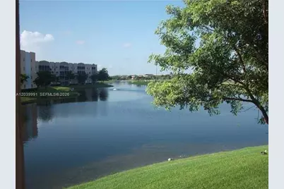 8030 N Nob Hill Rd #102, Tamarac, FL 33321 - Photo 7