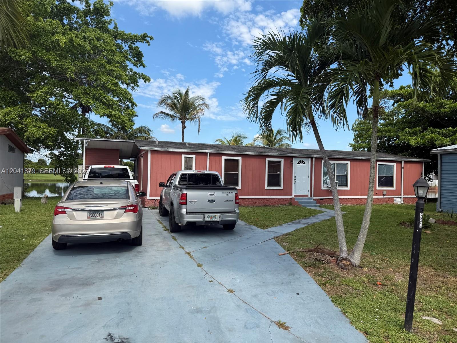 20606 NW 55th Ct #A - 20606 NW 55th Ct #A, Carol City, FL 33055 Luxury Property | Jose Angel Pina