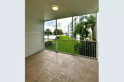 10750 NW 66th St #214, Doral, FL 33178 - Photo 1