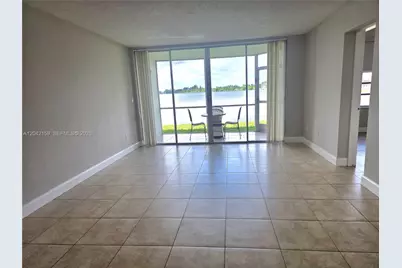 1300 NE 191st St #A106, Miami, FL 33179 - Photo 5