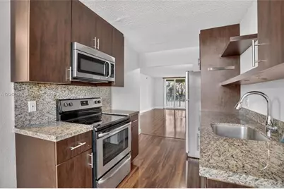 250 Jacaranda Dr #411, Plantation, FL 33324 - Photo 9