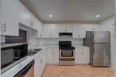 1200 NW 87th Ave #410, Coral Springs, FL 33071 - Photo 11