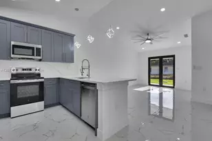 5117 24th St SW, Lehigh Acres, FL 33973 - Photo 5