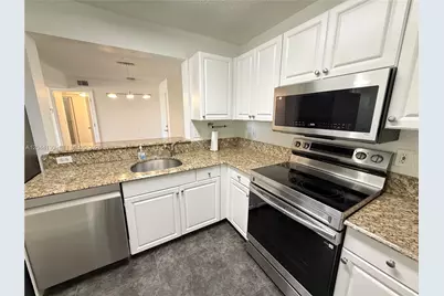 2711 Ocean Club Blvd #203, Hollywood, FL 33019 - Photo 1