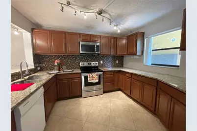9044 NW 28th Dr #3-106, Coral Springs, FL 33065 - Photo 3