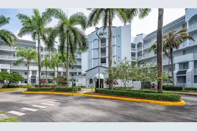 10700 NW 66th St #204, Doral, FL 33178 - Photo 1