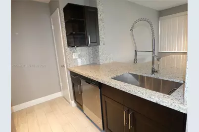 2831 N Oakland Forest Dr #101, Oakland Park, FL 33309 - Photo 3
