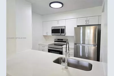 2890 N Oakland Forest Dr #102, Oakland Park, FL 33309 - Photo 1