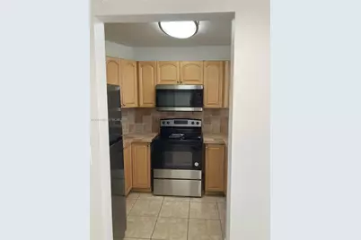 6995 NW 186th St #E403, Hialeah, FL 33015 - Photo 13