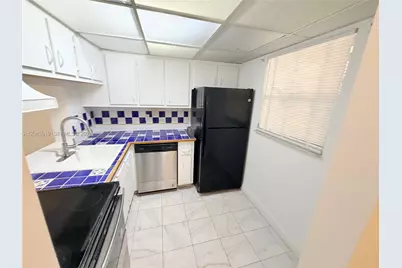 2800 NW 56th Ave #E201, Lauderhill, FL 33313 - Photo 5