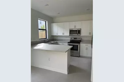 21447 NE 2nd Pl, Miami, FL 33179 - Photo 9