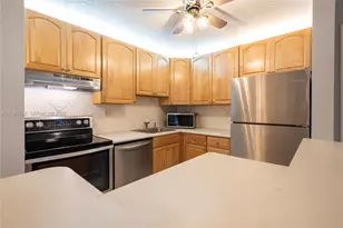 10789 W Clairmont Cir, Tamarac, FL 33321 - Photo 9