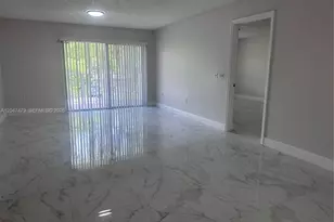 5011 Wiles Rd, Coconut Creek, FL 33073 - Photo 1