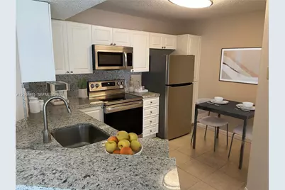 9033 Wiles Rd #206, Coral Springs, FL 33067 - Photo 11
