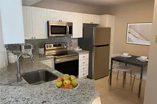 9033 Wiles Rd, Coral Springs, FL 33067 - Photo 11