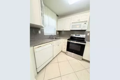 9660 Sunrise Lakes Blvd #202, Sunrise, FL 33322 - Photo 1