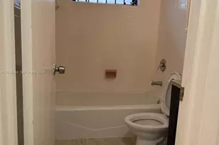 1019 NW 52nd St, Miami, FL 33127 - Photo 9