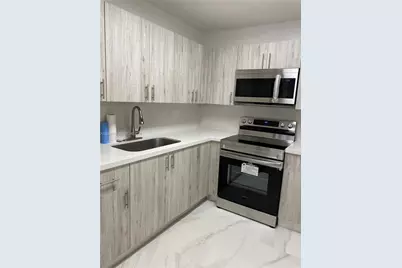 6190 W 19th Ave #206, Hialeah, FL 33012 - Photo 1