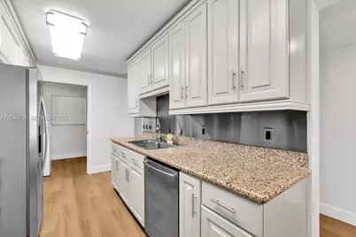 200 Golden Isles Dr #203, Hallandale Beach, FL 33009 - Photo 11