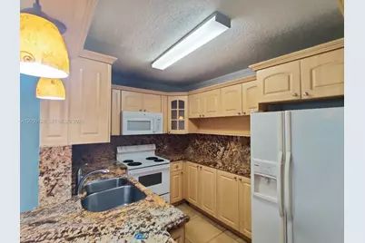 5705 W 20th Ave #215, Hialeah, FL 33012 - Photo 3