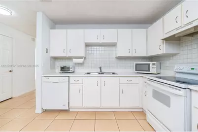 3877 NW 122nd Ter #1-L, Sunrise, FL 33323 - Photo 5