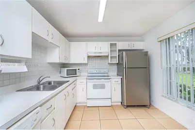 3877 NW 122nd Ter #1-L, Sunrise, FL 33323 - Photo 19