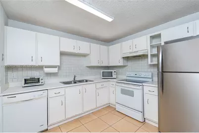 3877 NW 122nd Ter #1-L, Sunrise, FL 33323 - Photo 7