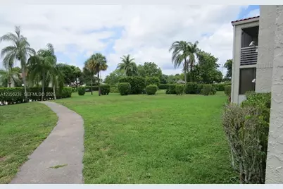 7435 Woodmont Ter #101, Tamarac, FL 33321 - Photo 1