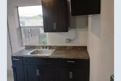 1241 W Dr Martin Luther King Jr Blvd W #4, Belle Glade, FL 33430 - Photo 1