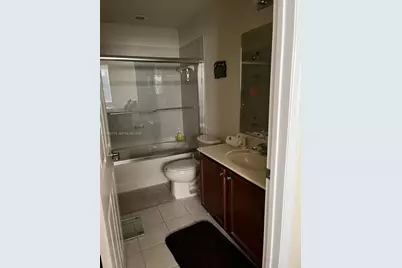 11401 NW 89th St #104, Doral, FL 33178 - Photo 13