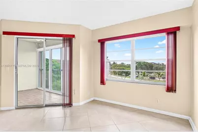 12701 SW 14th St #402J, Pembroke Pines, FL 33027 - Photo 11