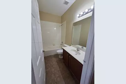 2851 W Prospect Rd #404, Tamarac, FL 33309 - Photo 11