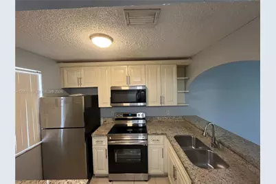 2740 Forest Hills Blvd #202, Coral Springs, FL 33065 - Photo 5